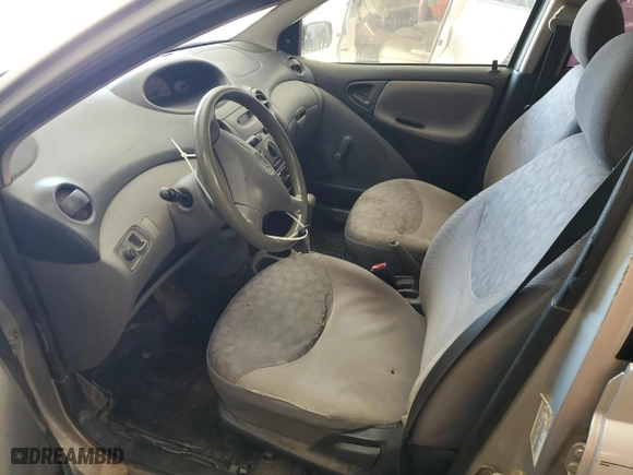 2001 Toyota ECHO with VIN JTDBT123110105869, listed as a Copart auction lot 79242824 with 194,146 mi miles and Salvage Title. Bid and sale history available at carsss.com. Image 7.