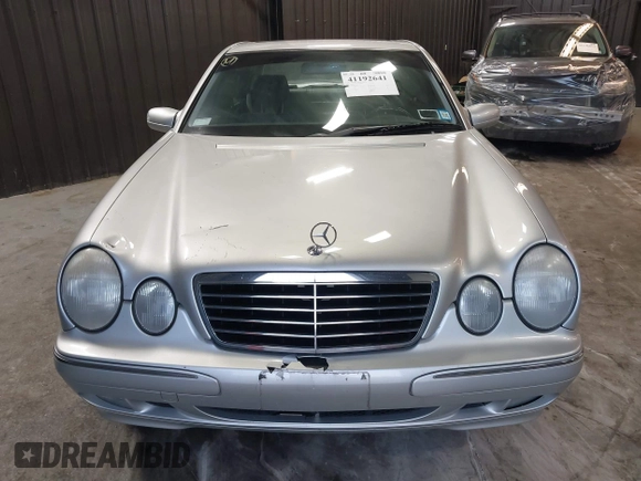 2002 Mercedes-Benz E-Class with VIN WDBJF82J52X062526, listed as a IAAI auction lot 41192641 with 126,352 mi miles. Bid and sale history available at carsss.com. Image 12.