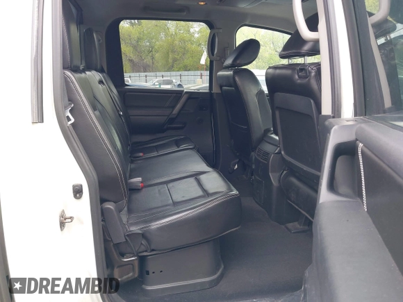 2014 Nissan Titan Pro-4X with VIN 1N6BA0ECXEN501915, listed as a IAAI auction lot 42097967 with 120,851 mi miles and . Bid and sale history available at DreamBid. Image 8.