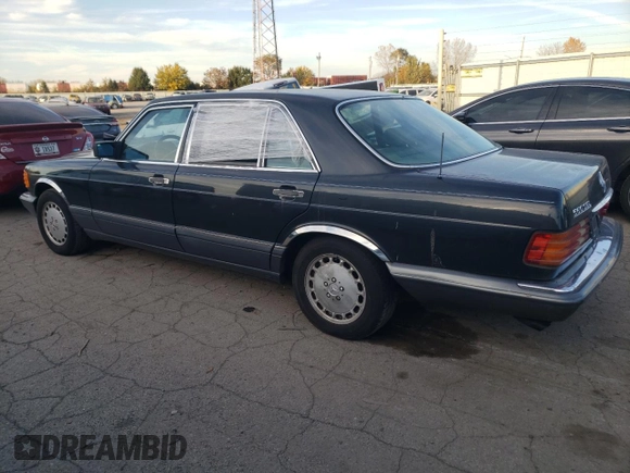 1991 Mercedes-Benz 560 with VIN WDBCA39E8MA567307, listed as a Copart auction lot 77488244 with 202,305 mi miles and Clean Title. Bid and sale history available at DreamBid. Image 2.