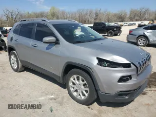 2016 Jeep Cherokee Altitude with VIN 1C4PJLCB0GW338774, listed as a Copart auction lot 50531685 with 163,351 mi miles and Salvage title. Bid and sale history available at DreamBid. Image 4.