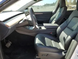 2023 Tesla Model Y Long Range z VIN 7SAYGDEE7PF788932, wystawiony jako Copart lot #52822515 z przebiegiem 33 007 mil mil oraz Szkoda całkowita • Salvage title. Historia ofert i sprzedaży dostępna na DreamBid. Obrazek 7.