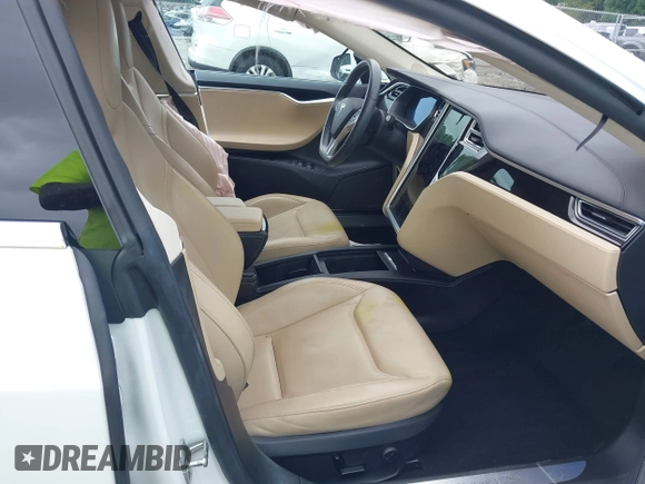 2016 Tesla Model S 70 with VIN 5YJSA1E11GF132984, listed as a IAAI auction lot 42428634 with Not provided miles and . Bid and sale history available at DreamBid. Image 5.