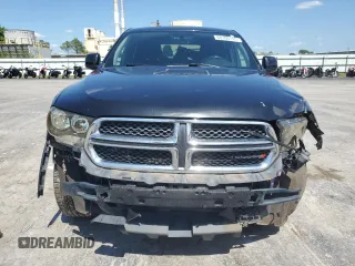 2013 Dodge Durango SXT with VIN 1C4RDJAG3DC575923, listed as a Copart auction lot 60100195 with 211,606 mi miles and Salvage title. Bid and sale history available at DreamBid. Image 5.