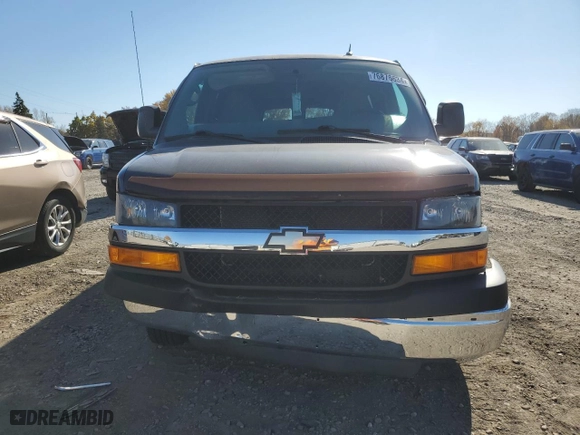 2014 Chevrolet Express Passenger LT with VIN 1GAZG1FG9E1197581, listed as a Copart auction lot 76876634 with 41,840 mi miles and Salvage Title. Bid and sale history available at carsss.com. Image 5.