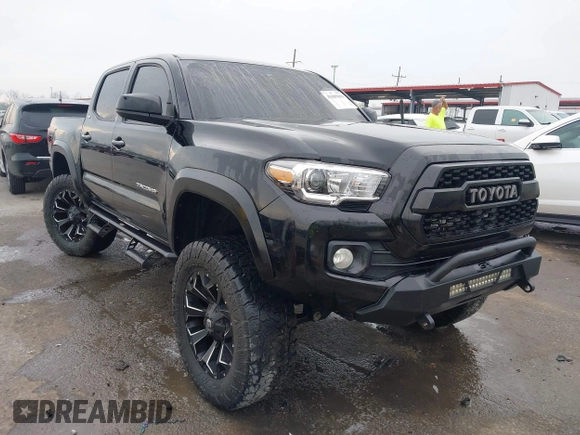 2017 Toyota Tacoma SR5 with VIN 5TFCZ5AN6HX076769, listed as a IAAI auction lot 41889869 with 208,894 mi miles. Bid and sale history available at carsss.com. Image 1.