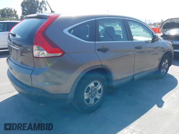 2013 Honda CR-V LX with VIN 3CZRM3H34DG705066, listed as a IAAI auction lot 42661478 with 318,027 mi miles and . Bid and sale history available at DreamBid. Image 4.