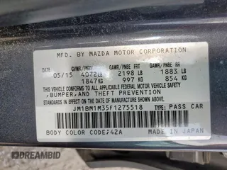 2015 Mazda 3 S Grand Touring с VIN JM1BM1M35F1275518, выставлен на аукционе Copart как лот 59630635 с пробегом 44 972 миль миль и Списание • Salvage title. История ставок и продаж доступна на DreamBid. Изображение 13.