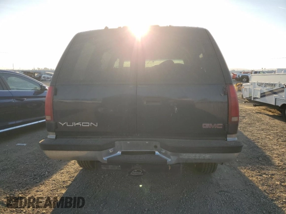 1999 GMC Yukon with VIN 1GKEK13RXXJ748733, listed as a Copart auction lot 74125914 with 172,766 mi miles and Clean Title. Bid and sale history available at carsss.com. Image 6.