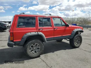 1996 Jeep Cherokee Sport with VIN 1J4FJ68S6TL213886, listed as a Copart auction lot 51462275 with 215,091 mi miles and Salvage title. Bid and sale history available at DreamBid. Image 3.