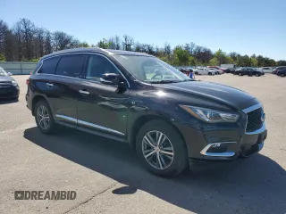 2019 Infiniti QX60 Luxe with VIN 5N1DL0MM4KC561711, listed as a Copart auction lot 57309695 with 46,642 mi miles and Salvage title. Bid and sale history available at DreamBid. Image 4.