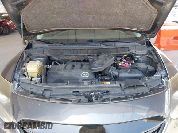 2013 Mazda CX-9 Sport with VIN JM3TB2BAXD0407958, listed as a IAAI auction lot 42346949 with 132,855 mi miles and . Bid and sale history available at DreamBid. Image 10.