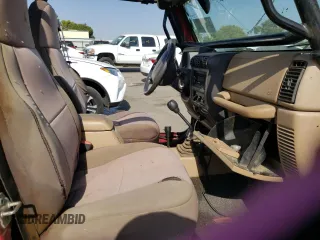 1999 Jeep Wrangler Sport with VIN 1J4FY19S5XP493117, listed as a Copart auction lot 57490792 with Not provided miles and Salvage title. Bid and sale history available at DreamBid. Image 5.