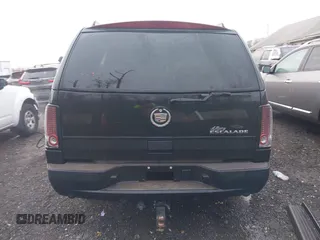 2002 Cadillac Escalade z VIN 1GYEK63N62R205809, wystawiony jako IAAI lot #41090723 z przebiegiem 180 631 mil mil oraz . Historia ofert i sprzedaży dostępna na DreamBid. Obrazek 16.