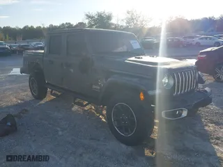 2023 Jeep Gladiator Overland with VIN 1C6HJTFG1PL546604, listed as a IAAI auction lot 41599632 with 23,108 mi miles. Bid and sale history available at carsss.com. Image 1.