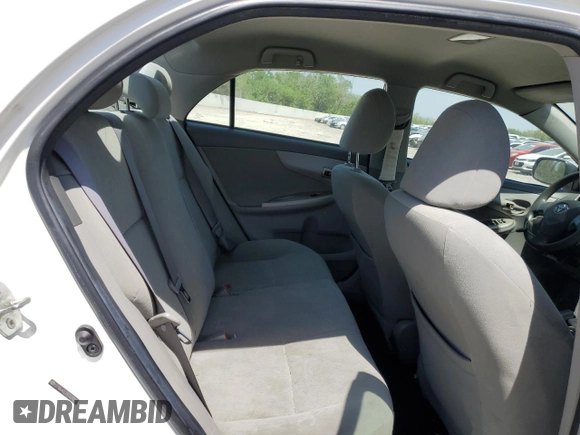 2010 Toyota Corolla with VIN 2T1BU4EE2AC329301, listed as a Copart auction lot 52970705 with 197,823 mi miles and Salvage Title. Bid and sale history available at DreamBid. Image 11.
