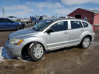 2010 Dodge Caliber SXT z VIN 1B3CB4HA4AD597158, wystawiony jako Copart lot #51757335 z przebiegiem 128 791 mil mil oraz Czysty tytuł • Clean title. Historia ofert i sprzedaży dostępna na DreamBid. Obrazek 1.