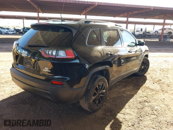 2021 Jeep Cherokee Latitude with VIN 1C4PJLCB2MD156274, listed as a IAAI auction lot 40850430 with 50,375 mi miles. Bid and sale history available at carsss.com. Image 4.