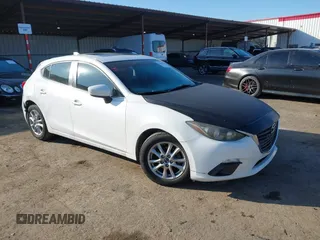 2014 Mazda 3 i Grand Touring with VIN JM1BM1M7XE1102093, listed as a IAAI auction lot 41344433 with 148,395 mi miles and . Bid and sale history available at DreamBid. Image 1.