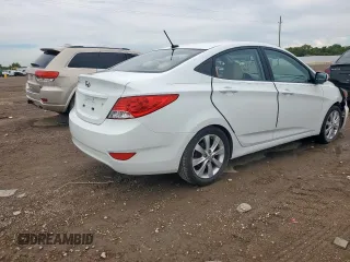 2012 Hyundai Accent GLS with VIN KMHCU4AEXCU069242, listed as a Copart auction lot 61475315 with 136,591 mi miles and Salvage title. Bid and sale history available at DreamBid. Image 3.