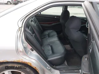 2003 Acura TL with VIN 19UUA56633A005104, listed as a IAAI auction lot 41925680 with 306,082 mi miles. Bid and sale history available at carsss.com. Image 8.