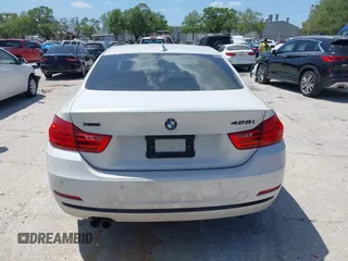 2015 BMW 4 Series 428i xDrive z VIN WBA3N5C58FK198825, wystawiony jako IAAI lot #41919172 z przebiegiem 125 421 mil mil oraz . Historia ofert i sprzedaży dostępna na DreamBid. Obrazek 16.