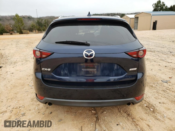2019 Mazda CX-5 Grand Touring with VIN JM3KFADM0K1596256, listed as a Copart auction lot 86323594 with 118,853 mi miles and Salvage title. Bid and sale history available at DreamBid. Image 6.
