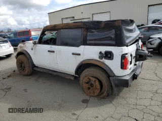 2023 Ford Bronco with VIN 1FMEE5BP0PLB59328, listed as a Copart auction lot 47301845 with 24,699 mi miles and Salvage Title. Bid and sale history available at carsss.com. Image 2.