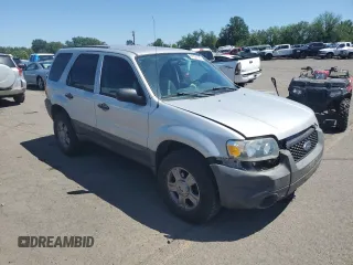 2005 Ford Escape XLS Value with VIN 1FMYU92Z55KC93604, listed as a Copart auction lot 60104145 with 86,788 mi miles and Salvage title. Bid and sale history available at DreamBid. Image 4.