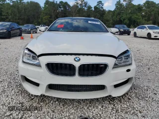 2014 BMW M6 z VIN WBSLX9C51ED160143, wystawiony jako Copart lot #73044214 z przebiegiem 91 717 mil mil oraz Szkoda całkowita • Salvage title. Historia ofert i sprzedaży dostępna na DreamBid. Obrazek 5.
