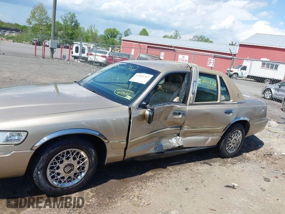 2000 Mercury Grand Marquis GS z VIN 2MEFM74W3YX610461, wystawiony jako IAAI lot #42162767 z przebiegiem 181 400 mil mil oraz . Historia ofert i sprzedaży dostępna na DreamBid. Obrazek 14.