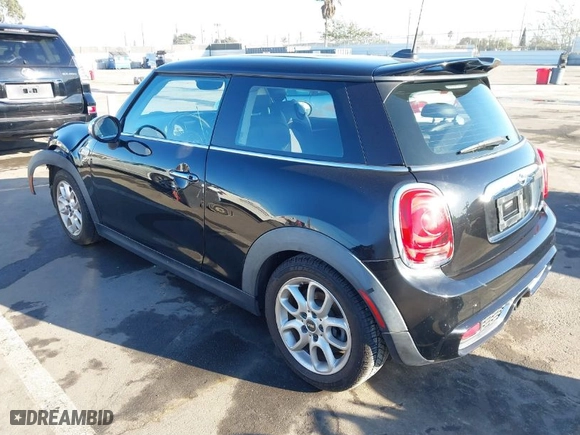 2014 MINI Cooper Hardtop S with VIN WMWXM7C59ET970371, listed as a IAAI auction lot 41643992 with NaN miles. Bid and sale history available at carsss.com. Image 3.
