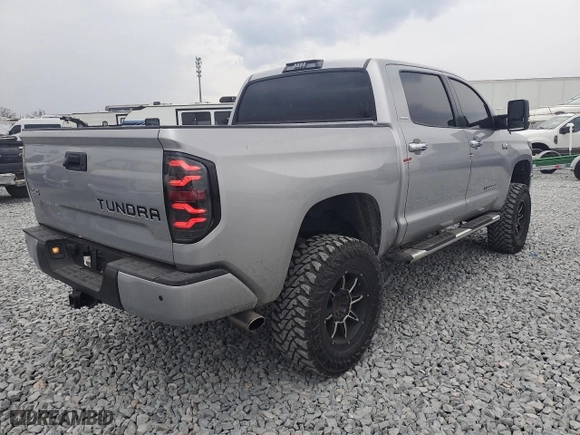 2015 Toyota Tundra 4WD Truck LTD with VIN 5TFHW5F12FX452093, listed as a Copart auction lot 44060665 with 105,803 mi miles and Salvage Title. Bid and sale history available at carsss.com. Image 4.
