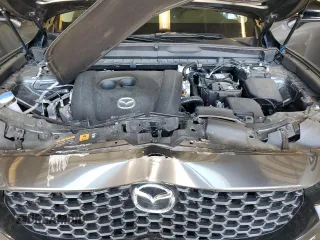 2024 Mazda CX-50 S Premium с VIN 7MMVABDMXRN173083, выставлен на аукционе Copart как лот 54336165 с пробегом 11 410 миль миль и Списание • Salvage title. История ставок и продаж доступна на DreamBid. Изображение 12.