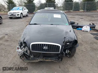 2004 Hyundai Sonata GLS with VIN KMHWF35HX4A068682, listed as a IAAI auction lot 41933856 with 127,508 mi miles. Bid and sale history available at carsss.com. Image 13.