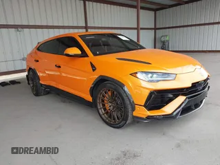2023 Lamborghini Urus Performante z VIN ZPBUC3ZL6PLA25073, wystawiony jako IAAI lot #41450564 z przebiegiem 13 945 mil mil oraz . Historia ofert i sprzedaży dostępna na DreamBid. Obrazek 1.