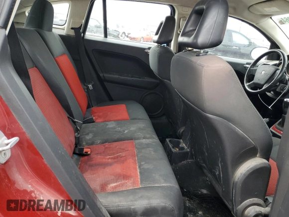 2009 Dodge Caliber SXT with VIN 1B3HB48CX9D108152, listed as a Copart auction lot 81012064 with 189,650 mi miles and Salvage Title. Bid and sale history available at DreamBid. Image 10.
