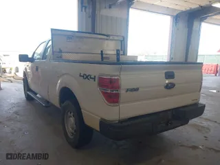 2014 Ford F-150 XL with VIN 1FTFX1EF9EKE41386, listed as a IAAI auction lot 40204338 with 215,536 mi miles. Bid and sale history available at carsss.com. Image 3.