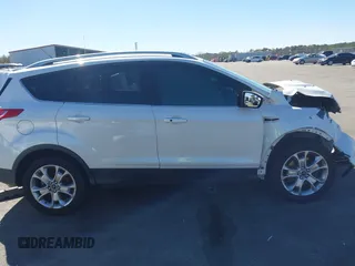 2015 Ford Escape Titanium with VIN 1FMCU0J94FUA69088, listed as a IAAI auction lot 41810406 with 167,749 mi miles. Bid and sale history available at carsss.com. Image 13.