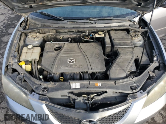 2005 Mazda 3 i with VIN JM1BK12F751242280, listed as a Copart auction lot 84316214 with 222,131 mi miles and Salvage Title. Bid and sale history available at DreamBid. Image 11.