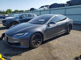 2017 Tesla Model S 100D с VIN 5YJSA1E2XHF185516, выставлен на аукционе Copart как лот 61816135 с пробегом 132 267 миль миль и Списание • Salvage title. История ставок и продаж доступна на DreamBid. Изображение 1.