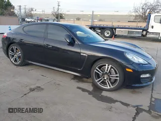 2013 Porsche Panamera with VIN WP0AA2A79DL010118, listed as a IAAI auction lot 41611724 with 191,343 mi miles and . Bid and sale history available at DreamBid. Image 1.