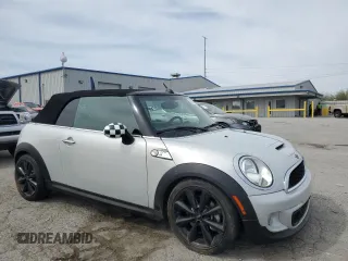 2014 MINI Convertible S with VIN WMWZP3C53ET707205, listed as a Copart auction lot 52179175 with 101,209 mi miles and Salvage Title. Bid and sale history available at DreamBid. Image 4.