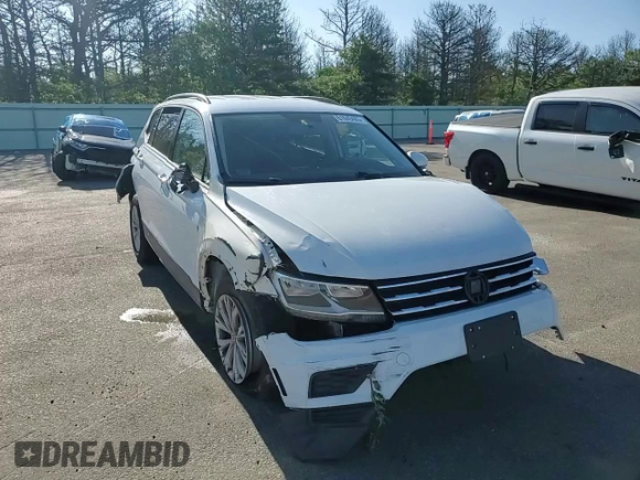 2020 Volkswagen Tiguan S with VIN 3VV1B7AX0LM037667, listed as a Copart auction lot 61649485 with 71,557 mi miles and Salvage title. Bid and sale history available at DreamBid. Image 14.