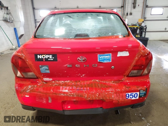 2000 Toyota ECHO with VIN JTDBT1237Y0095990, listed as a Copart auction lot 89140295 with 214,941 mi miles and Salvage Title. Bid and sale history available at DreamBid. Image 6.