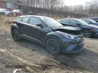 2019 Toyota C-HR XLE with VIN NMTKHMBX2KR090897, listed as a Copart auction lot 50128715 with 172,411 mi miles and Clean Title. Bid and sale history available at DreamBid. Image 4.
