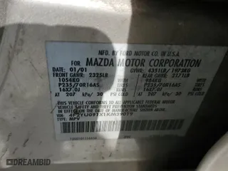 2001 Mazda Tribute LX with VIN 4F2YU091X1KM39019, listed as a Copart auction lot 50946945 with 255,148 mi miles and Salvage Title. Bid and sale history available at carsss.com. Image 13.