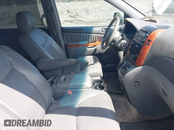 2008 Toyota Sienna XLE with VIN 5TDZK22C18S178979, listed as a IAAI auction lot 42024980 with 202,865 mi miles. Bid and sale history available at carsss.com. Image 5.