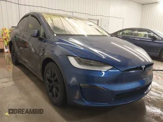 2022 Tesla Model X with VIN 7SAXCBE51NF328593, listed as a IAAI auction lot 41407110 with 1 mi miles. Bid and sale history available at carsss.com. Image 1.