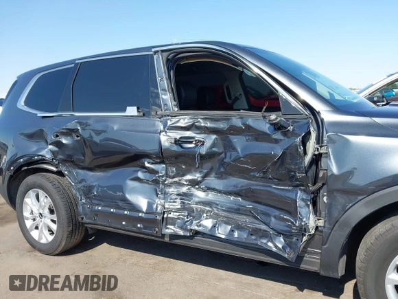 2022 Kia Telluride LX z VIN 5XYP2DHCXNG286083, wystawiony jako IAAI lot #42455962 z przebiegiem 24 599 mil mil oraz . Historia ofert i sprzedaży dostępna na DreamBid. Obrazek 12.
